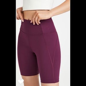 Girlfriend collective high rise bike shorts (plum)